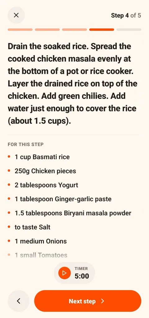 CookThis cooking mode step 4 of 5: spread chicken masala in a pot or rice cooker, layer drained soaked rice on top, add green chilies and about 1.5 cups water